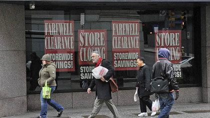 Clearance signs at Saks Fifth Avenue on Smithfield Street. The Downtown store will close on St. Patrick's Day.