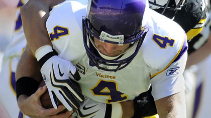 James Farrior sacks Brett Favre during a 2009 game at Heinz Field.
