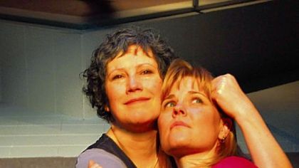 Laurie Klatscher, left, as the Ape and Kelly McAndrew as Brodie in the final, fantasized moment of "Precious Little" at City Theatre.