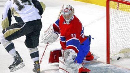 Canadiens goalie Carey Price makes a save against Penguins center Dustin Jeffrey in the first period Tuesday in Montreal.