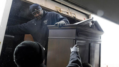 James Wallace, owner of U Call, We'll Haul, delivers a cabinet to Glade Run Lutheran Services in Zelienople on Jan. 18.