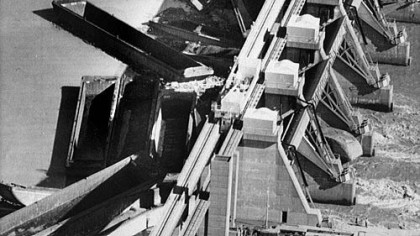 On Nov. 9, 1985, a fleet of barges pushed by the flooded Monongahela River clogs the gates at the Maxwell Dam and Locks near Brownsville.