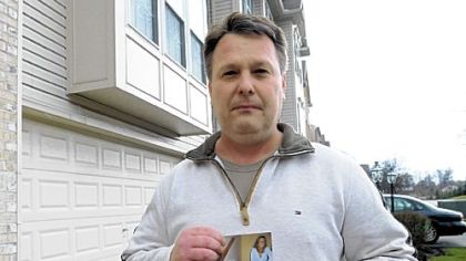 Joe Daum, uncle of victim Michael Schaab, waited for word with other family members after the shooting.