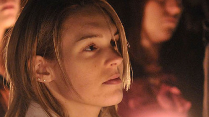 Michael Schaab's fiancee, Megan Shively of Regent Square, was among those at a vigil marking his killing.
