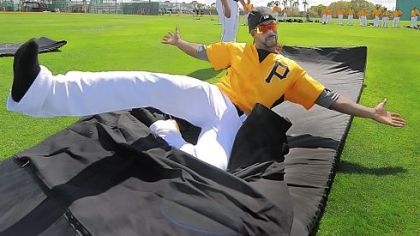 Pittsburgh Pirates Andrew McCutchen mugs for the camera during sliding drills at Pirate City Bradenton Florida
