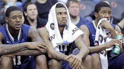 J.J. Moore, left, and Lamar Patterson look on during Pitt's game against Seton Hall Sunday in Newark, N.J. Seton Hall won the Big East contest, 73-66.
