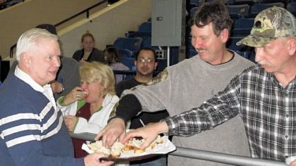 At the 2011 Eastern Sports & Outdoor Show in Harrisburg, attendees sample Smoked Trout Spread.