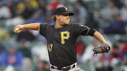 Pirates pitcher Evan Meek picthes in a game against the Cubs in Chicago last season.