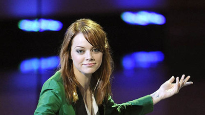 Emma Stone accepts the award for favorite movie actress during the People's Choice Awards.