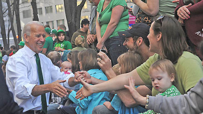 Vice President Joe Biden greets spectators along Grant Street during today's St. Patrick's Day Parade Downtown.