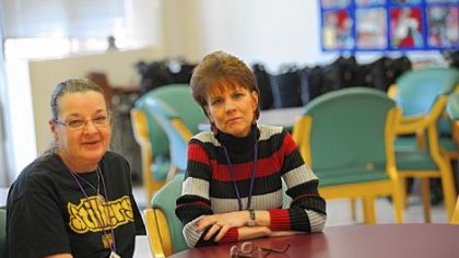 Kim Fussenegger, a registered nurse, and Patty Takacs, director of adult day care services at Vintage in East Liberty, which is ending its day care services.