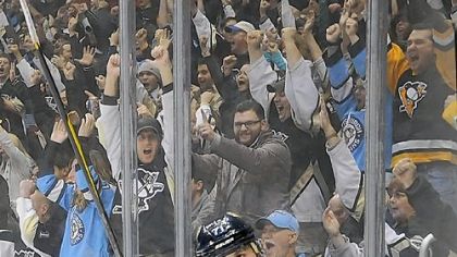 Evgeni Malkin celebrates Friday after scoring the shootout winner against the Canadiens.