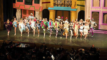 Rivervew High School entertains with a kickline in "A Funny Thing Happened on the Way to the Forum."
