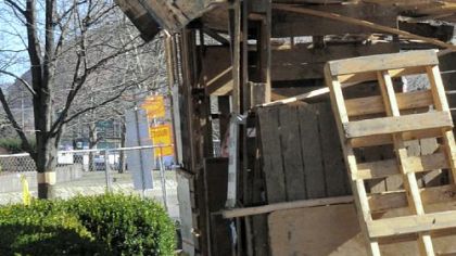 Workers break down the Trojan Horse, made of lumber and pallets, which was a symbol of the last days of the Occupy Pittsburgh encampment Thursday on Mellon Green. The last of the protesters left Wednesday.