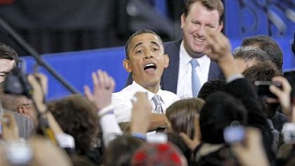 President Barack Obama shakes hands with students at the University of Michigan in Ann Arbor, Mich., on Friday. Mr. Obama spoke about college affordability to the crowd of more than 3,000 students, saying that he is pressuring Congress for new initiatives.