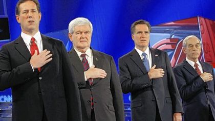 Republican presidential candidates from left: former Pennsylvania Sen. Rick Santorum, former House Speaker Newt Gingrich, former Massachusetts Gov. Mitt Romney and Texas Rep. Ron Paul take part in the national anthem at the start of the Republican debate Thursday night at the University of North Florida in Jacksonville, Fla.