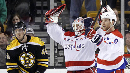 The Boston Bruins come to town today off a 4-3 loss to Washington Saturday in Boston. Washington's Tomas Vokoun, center, and Dennis Wideman celebrate next to the Bruins' David Krejci.