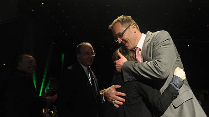 Penguins coach Dan Bylsma hugs son Bryan, 13, at the Dapper Dan Dinner and Sports Auction.