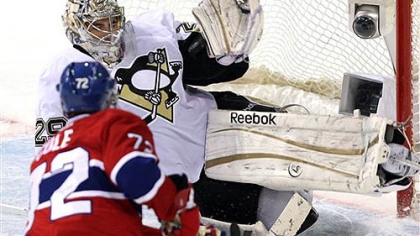 Marc-Andre Fleury stops a shot by Canadiens right wing Erik Cole in the second period Tuesday in Montreal.