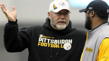 The Steelers announced that offensive coordinator Bruce Arians, seen here with Coach Mike Tomlin, is retiring.