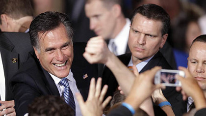 Mitt Romney greets supporters at his Nevada caucus night victory party.