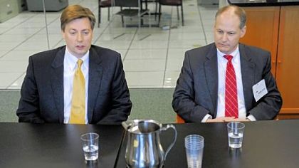Congressmen Jason Altmire, left, and Mark Critz speak with the Pittsburgh Post-Gazette's editorial board Friday.