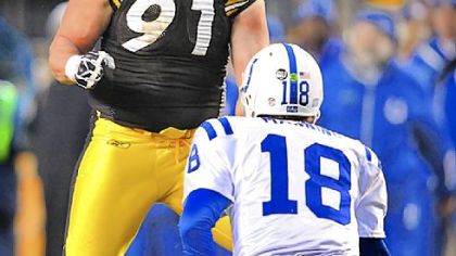Steelers defensive end Aaron Smith celebrates after sacking Colts quarterback Peyton Manning during a 2008 game.