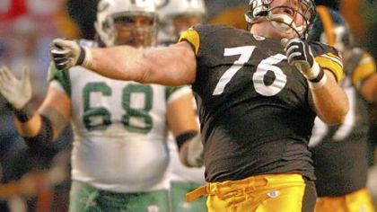 The Steelers' Chris Hoke celebrates after sacking New York Jets quarterback Chad Pennington during a division round playoff game in January 2005 at Heinz Field.