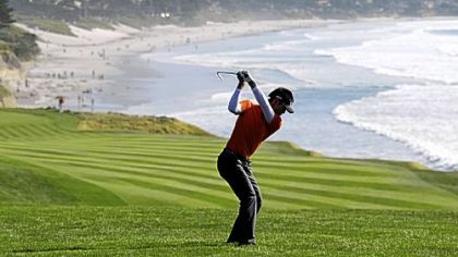 Danny Lee, of New Zealand, one of three tied for the lead at 9 under after the first round Thursday, hits from the ninth fairway of the Pebble Beach Golf Links.