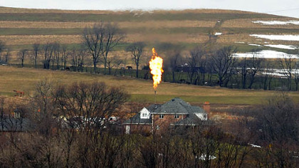 Flames shoot from a well in Mount Pleasant. Washington County.