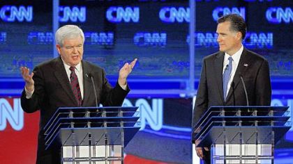 Former Speaker of the House Newt Gingrich, left, and former Massachusetts Gov. Mitt Romney spar during a Republican presidential debate Thursday at the University of North Florida in Jacksonville, Fla. The debate is the last one before Tuesday's Florida primary.