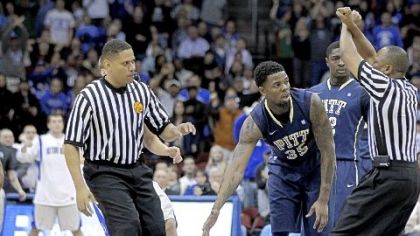 Referee Michael Stephens calls a flagrant foul on Pitt's Nasir Robinson against Seton Hall's Herb Pope as referee Michael Nance, left, looks on in the second half Sunday in Newark, N.J. The call put Pope on the line for two free throws and gave Seton Hall possession of the ball. Seton Hall won, 73-66.