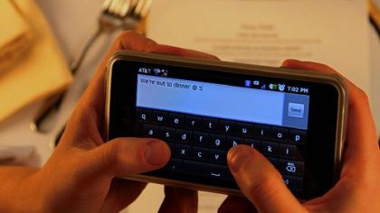 Diners can't do without smartphones, so restaurants are (mostly) tapping into the spirit