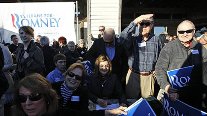 Supporters wait for Republican presidential candidate Mitt Romney to campaign Saturday at the Fish House in Pensacola, Fla.