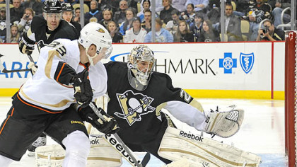 Penguins goalie Marc-Andre Fleury makes a save against Anaheim Ducks' Jason Blake.
