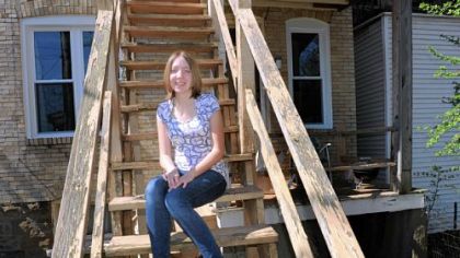 As court ponders legalities, city woman realizes benefits of coverage