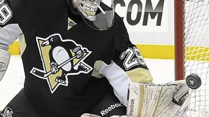 Marc-Andre Fleury makes one of his 28 saves against the Panthers Friday at Consol Energy Center.