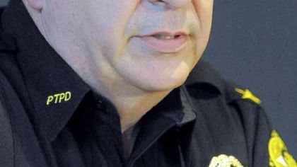 Peters police Chief Harry Fruecht