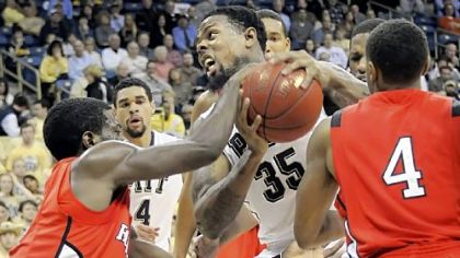 Nasir Robinson struggles to get a shot off against Rutgers Wednesday.