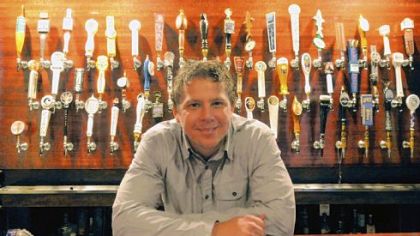 Matt Hough in the new tap room at the Copper Kettle Brewing Co. in Greenfield.