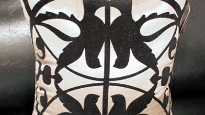 Dove pillow from the Priscilla Presley Home Collection.