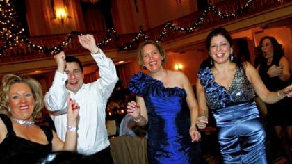 Ron Alvarado, gala chair with wife Courtney far right, joined by friends of the chamber.