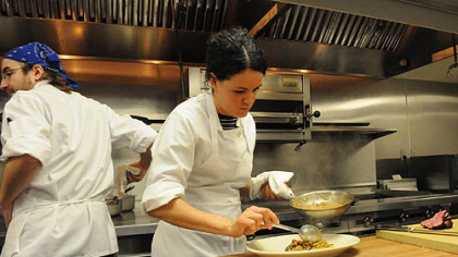 Sous chef Jamilka Borges prepares a dish at Legume Bistro in Oakland.