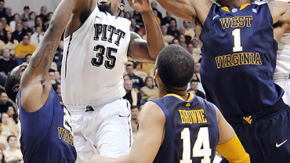 Pitt's Nasir Robinson (35) drives to the basket against West Virginia in the first half Thursday night at the Petersen Events Center.