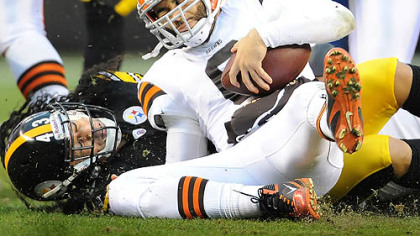 Steelers Troy Polamalu sacks Browns quarterback Seneca Wallace in the first half of tonight's game in Cleveland.