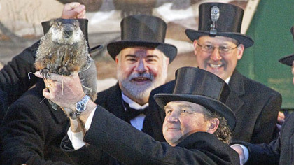 Groundhog Club handler John Griffiths holds Punxsutawney Phil, the weather prognosticating groundhog, during the 126th celebration of Groundhog Day on Gobbler's Knob.