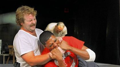 Ian Pisarcik as Officer John Vojtas and Corey Talley as Jonny Gammage rehearse the apprehension and fight scene.