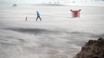 Photographer Michael Henninger's work earned him recognition as Region 3 Photographer of the Year for 2011 (out of 11 regions nationally) in the National Press Photographers Association's Monthly Clip contest.  One of his winning photographs was of Hurricane Irene's gusts.