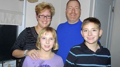 Tara Reis with her husband, Jim Reis, son Adam and daughter Reilly.