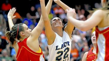 Vincentian Academy's Ashlee Darby, right, has her shot tipped by North Catholic's Angela Nowacki in a PIAA Class A semifinal at Ambridge.
